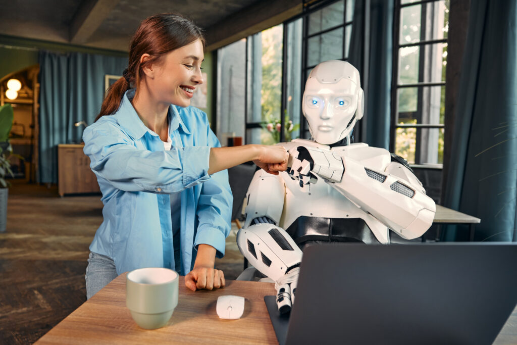 robot and woman working in an office
